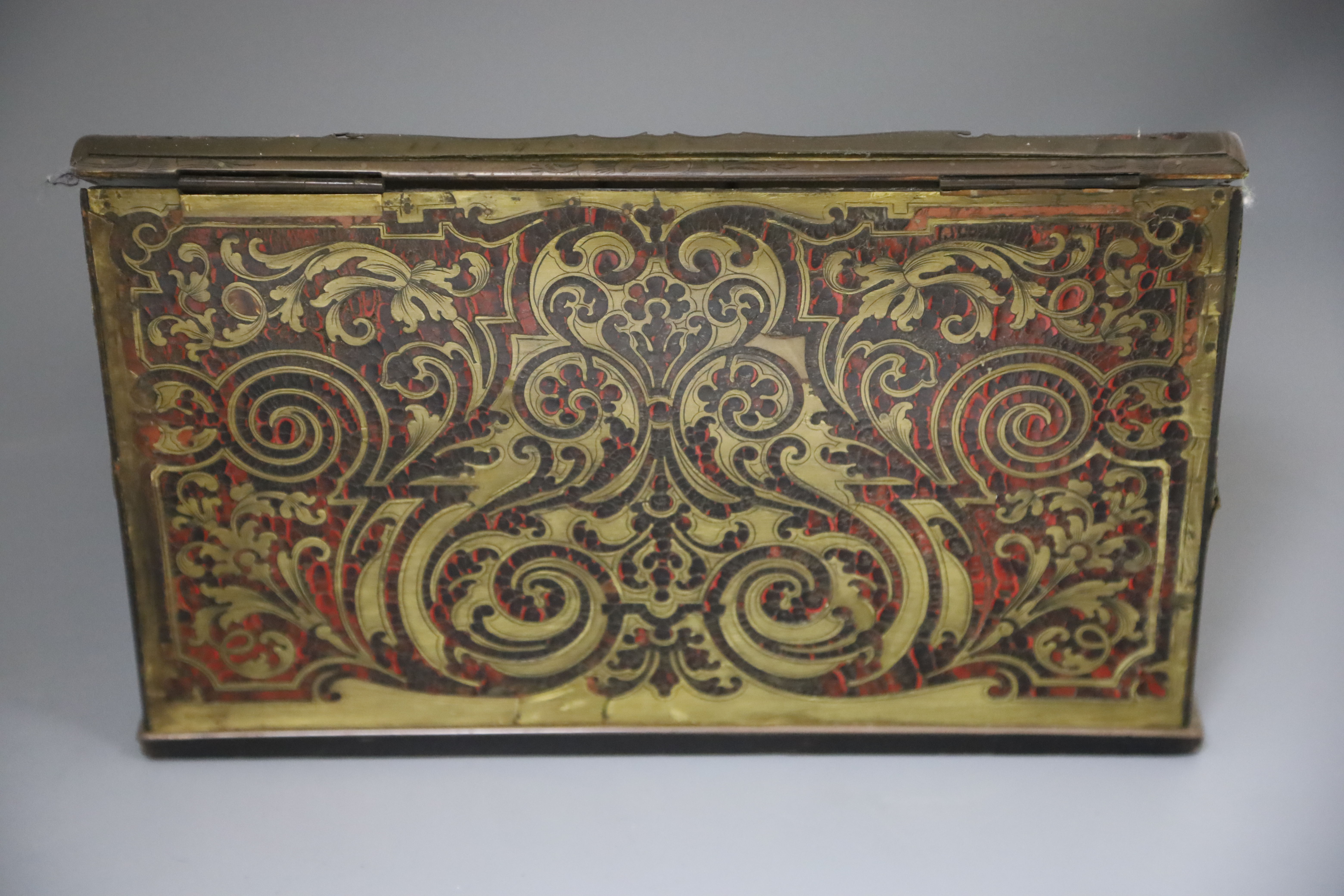 An early 20th century French red boulle work lap desk, width 13in. depth 11.5in. height 8in.